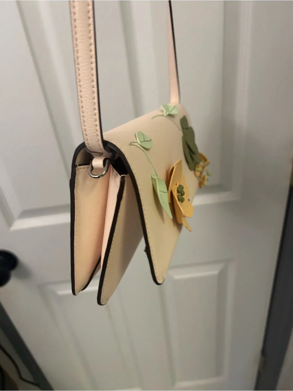 NWOT KATE SPADE floral appliqué leather crossbody bag.